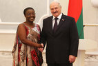 Belarus President Alexander Lukashenko and Ambassador Extraordinary and Plenipotentiary of Rwanda to Belarus Jeanne d'Arc Mujawamariya