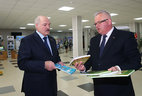 Belarus President Alexander Lukashenko and Education Minister Igor Karpenko