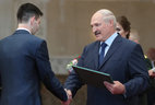 Graduate of the Belarusian State Technical University Kirill Trusov receives the President's letter of commendation