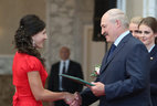 Graduate of the Belarusian State University of Physical Education Yuliya Zakharevich receives the President's letter of commendation