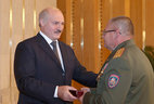 The Order for Service to the Homeland 3rd Class is presented to colonel of the interior service Alexander Ukrainets, head of the Gomel Engineer Institute of the Emergencies Ministry