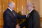 Worker of the agricultural company Agrokombinat Snov Vyacheslav Sharapa receives the Order of Honor
