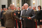 Graduate of the Command and Staff Department of the Military Academy Sergei Boris receives a letter of commendation from the President