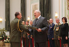 Graduate of the Command and Staff Department of the Military Academy Andrei Tkachenko receives a letter of commendation from the President