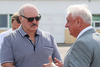 Alexander Lukashenko and Mikhail Myasnikovich during the visit to the dairy farm Kvasevichi in Ivatsevichi District