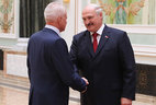 Director of the institute for the retraining and professional advancement of judges, workers of prosecution bodies and justice institutions of the Belarusian State University Valery Godunov receives the Honored Worker of Education of Belarus title