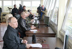 Alexander Lukashenko and Vladimir Putin watched the army exercise from an observation post at the Gozhsky firing range