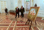 Belarus President Alexander Lukashenko and Venezuela President Nicolas Maduro exchange presents after the official negotiations in Minsk. The Belarusian head of state presents a tapestry with an image of Mir Castle to his Venezuelan counterpart