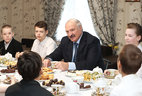 Alexander Lukashenko visits the Novikov family