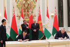 Belarus President Alexander Lukashenko and Tajikistan President Emomali Rahmon during a ceremony of signing bilateral documents