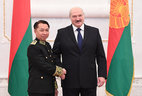 Belarus President Alexander Lukashenko and Ambassador Extraordinary and Plenipotentiary of Cambodia to Belarus Ker Vicseth