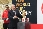 Alexander Lukashenko with the FIFA World Cup Trophy