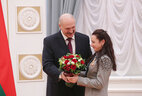 Alexander Lukashenko gives the Order for Personal Courage and the Honored Master of Sport of Belarus title to Olympic champion Iryna Kryuko