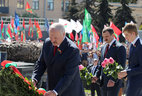 Belarus President Alexander Lukashenko lays a wreath at the Victory Monument in Minsk