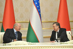 Belarus President Alexander Lukashenko and Uzbekistan President Shavkat Mirziyoyev during the meeting with mass media representatives