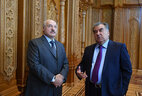 The president of Tajikistan shows Alexander Lukashenko around the halls in the Palace of the Nation decorated with handmade wood carvings inspired by national motifs