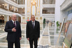 Before the talks Ilham Aliyev and Alexander Lukashenko toured a photo exhibition featuring the most remarkable sightseeing attractions in Belarus at the Palace of Independence