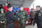 Aleksandr Lukashenko talks to tank biathletes