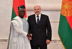 Belarus President Aleksandr Lukashenko and Ambassador Extraordinary and Plenipotentiary of Benin to Belarus Noukpo Clement Kiki