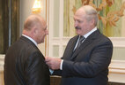 Chairman of the Brest District Executive Committee Vladimir Matsuka receives the Honored Worker of Agriculture of Belarus title