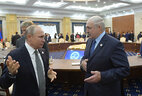 Belarus President Aleksandr Lukashenko meets with Russia President Vladimir Putin on the sidelines of the SCO summit